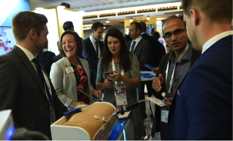 Delegates view innovative products at the industrial exhibition at an ISHA Annual Scientific Meeting