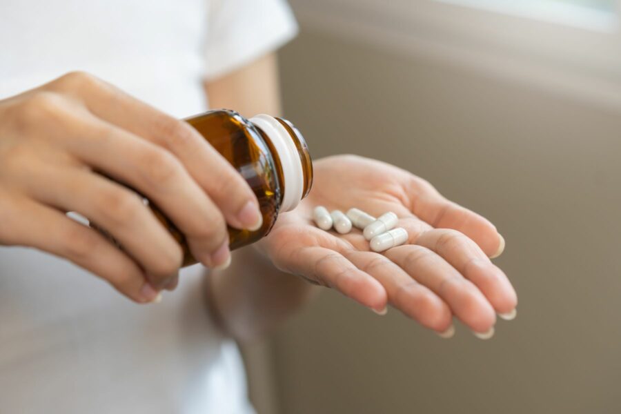 A patient taking tablets