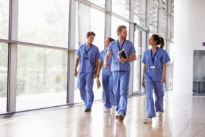 Nurses walking along a corridor